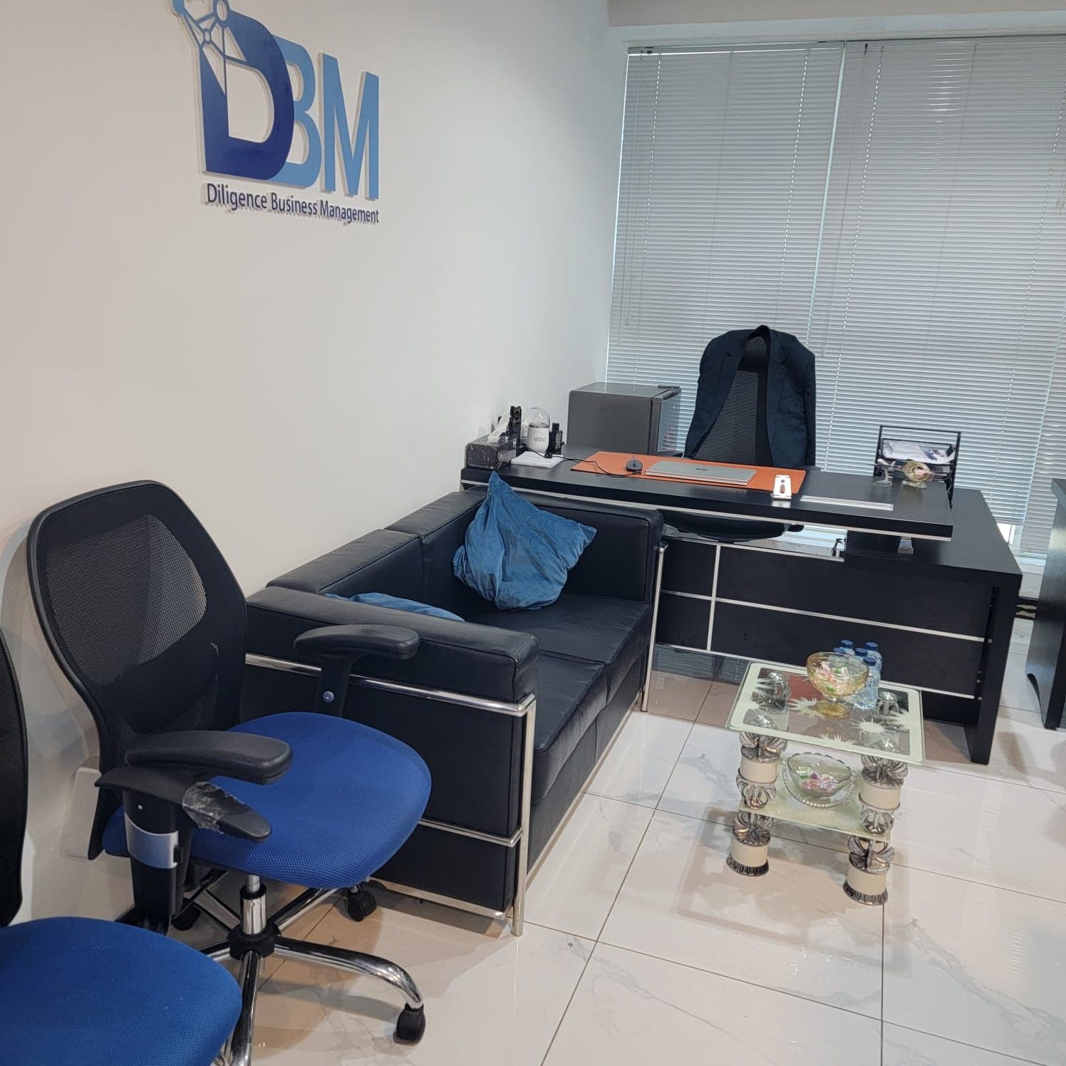 Manager's cabin at the DBM office with the DBM logo wall, Aspin Commercial Tower, Dubai