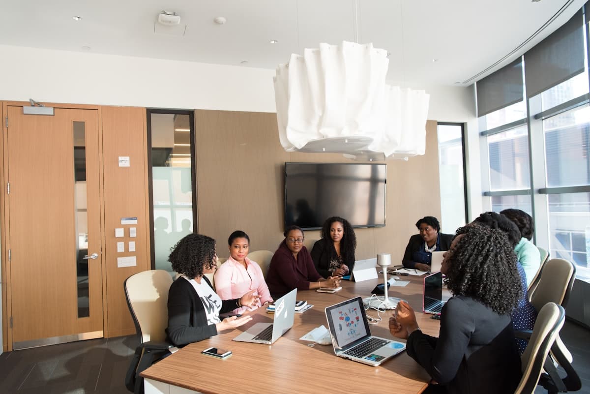 Business consultants in a boardroom meeting reviewing company formation plans